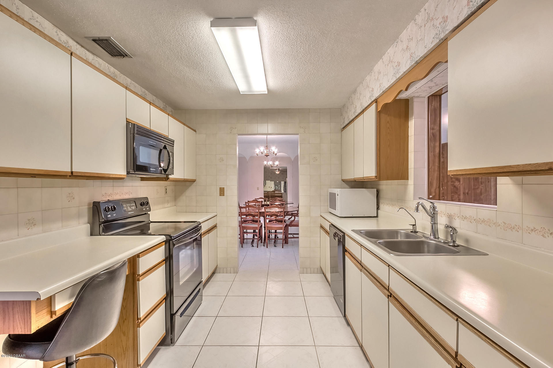 1028 Cherokee Ranch Road Holly Hill, FL 32117 - Photo 7 of 34 Kitchen to Kitchenette area