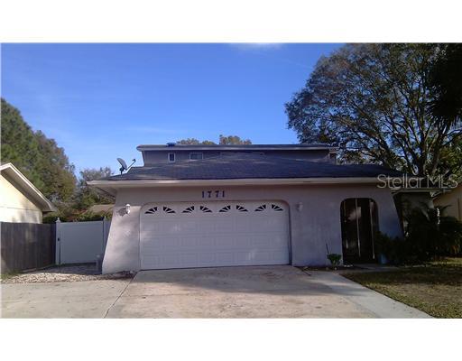 1771 East Grovehill Road Palm Harbor, FL 34683 - Photo 1 of 1 Exterior Front - Welcome home