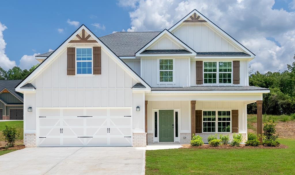 front view of a house and a yard
