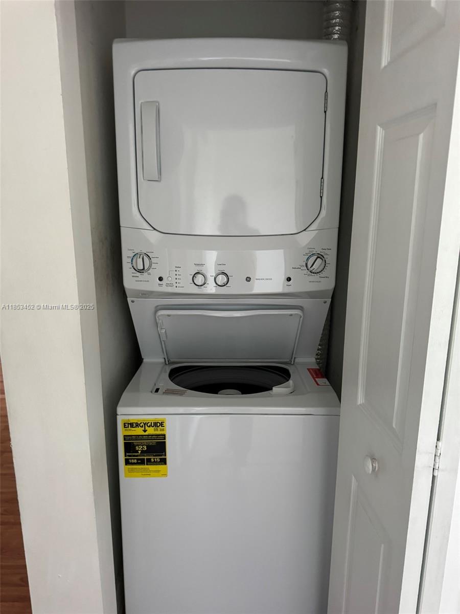 11060 Southwest 196th Street, Unit 512 Cutler Bay, FL 33157 - Photo 17 of 19 a utility room with dryer and washer