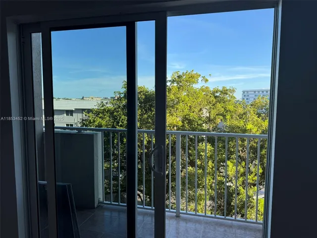 a view of a balcony with an outdoor space