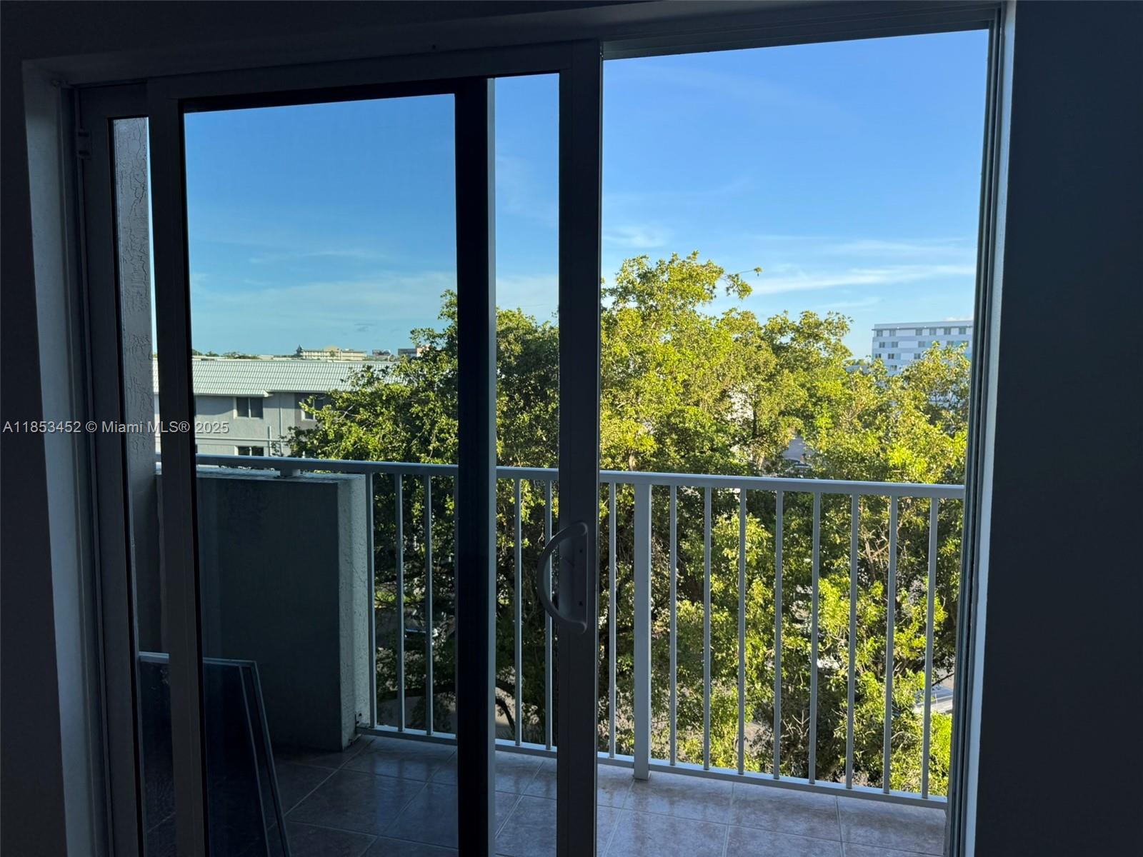 11060 Southwest 196th Street, Unit 512 Cutler Bay, FL 33157 - Photo 18 of 19 a view of a balcony with an outdoor space