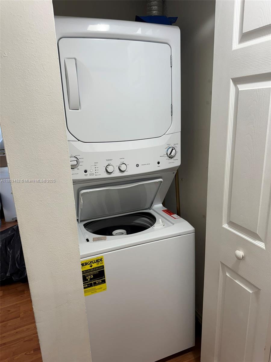11060 Southwest 196th Street, Unit 512 Cutler Bay, FL 33157 - Photo 3 of 19 a utility room with dryer and washer