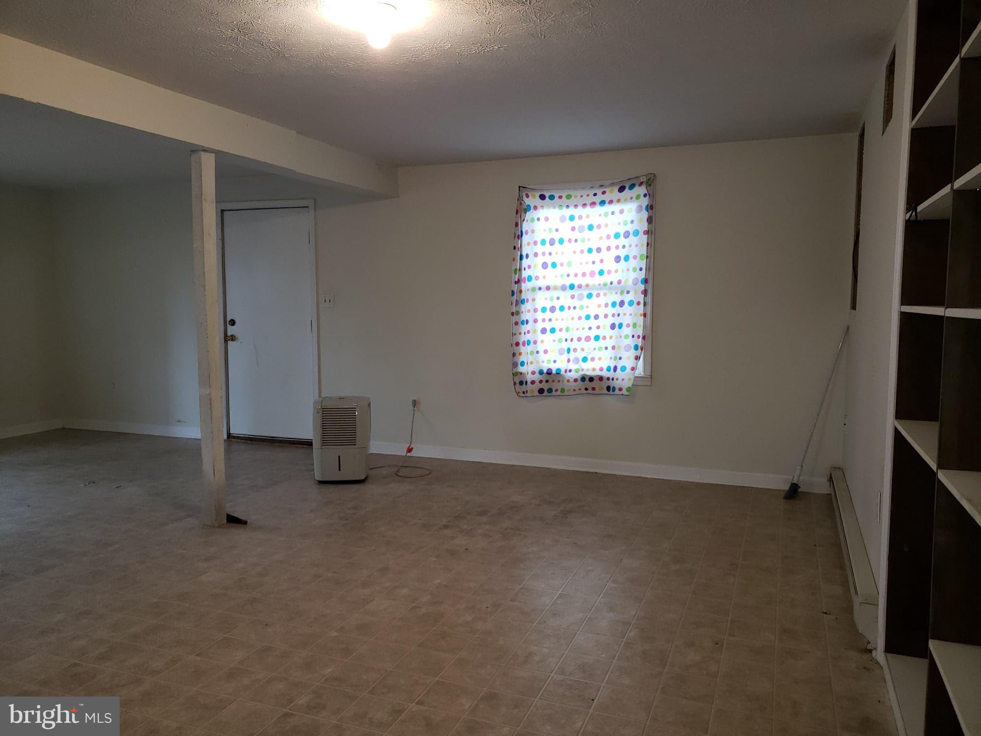 215 Ridgefield Avenue Stephens City, VA 22655 - Photo 11 of 21 Partially finished basement