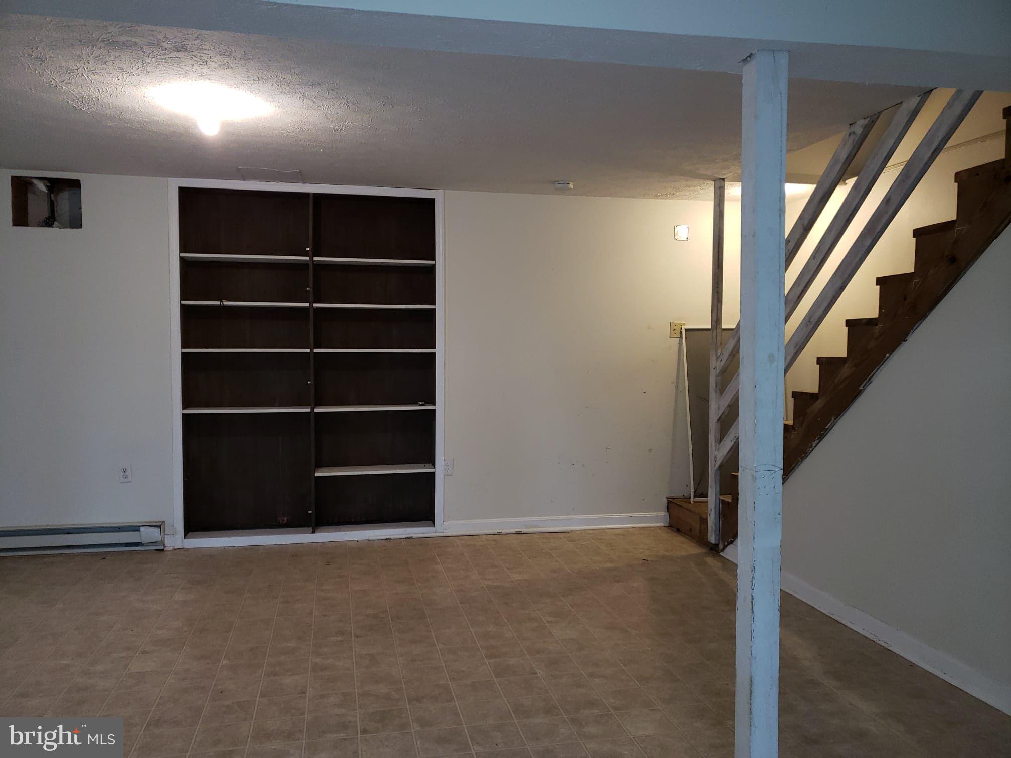 215 Ridgefield Avenue Stephens City, VA 22655 - Photo 12 of 21 Build in shelves in basement