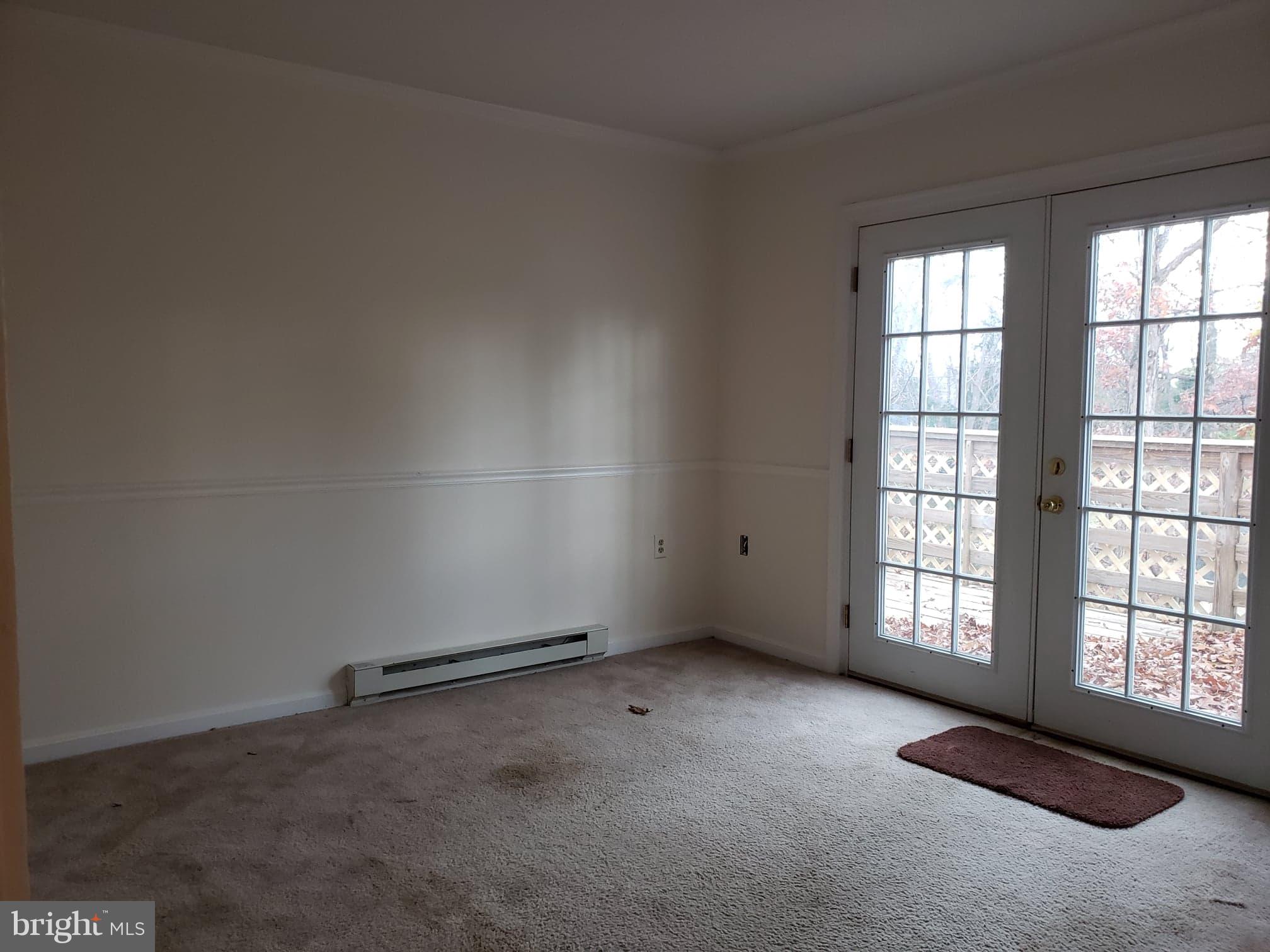 215 Ridgefield Avenue Stephens City, VA 22655 - Photo 9 of 21 Den/Office with deck access.