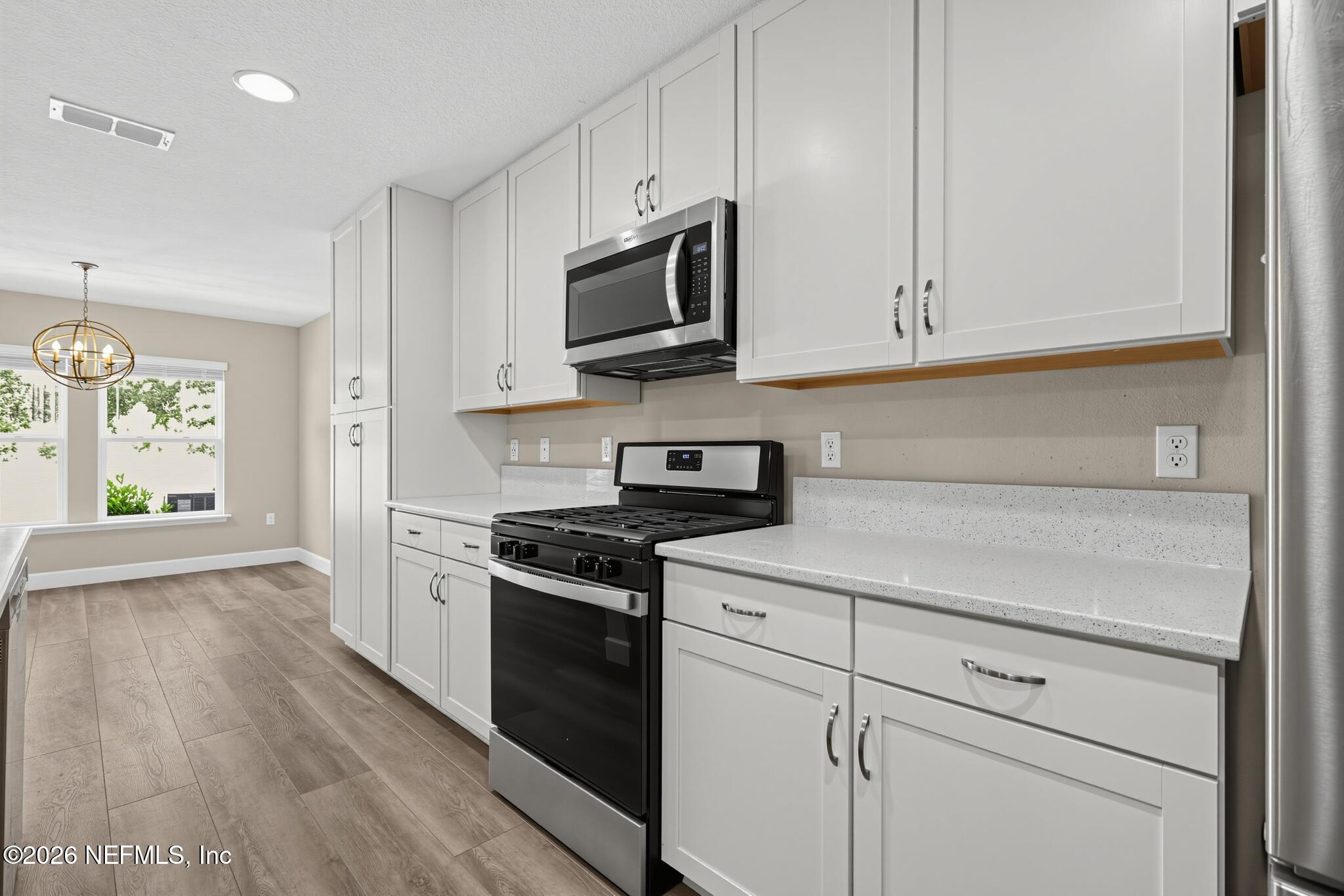 331 Meadow Ridge Drive St. Augustine, FL 32092 - Photo 14 of 36 18_331_Meadow_Ridge_Dr-Kitchen-7797