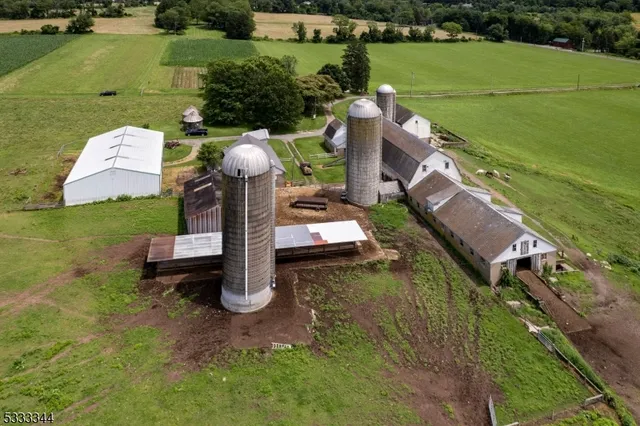 a view of a lake with houses in the back