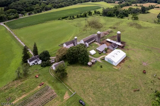 an aerial view of a house with outdoor space swimming pool and outdoor seating