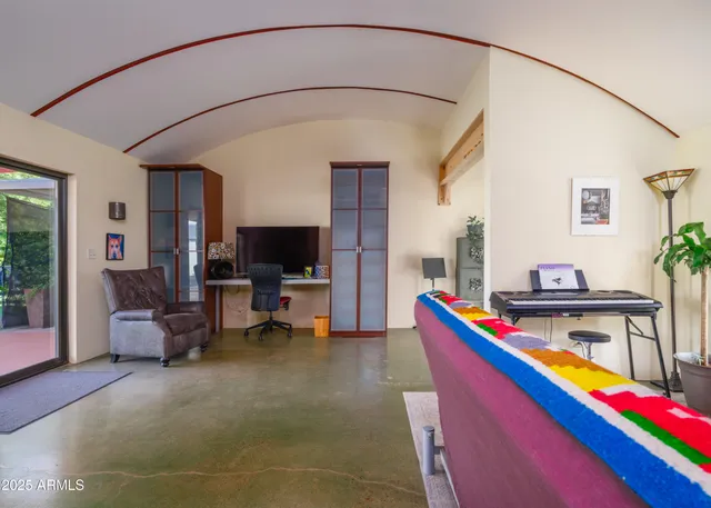 a kitchen with stainless steel appliances granite countertop a stove a sink and white cabinets