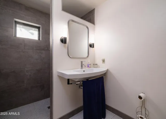 a room with furniture and flowers