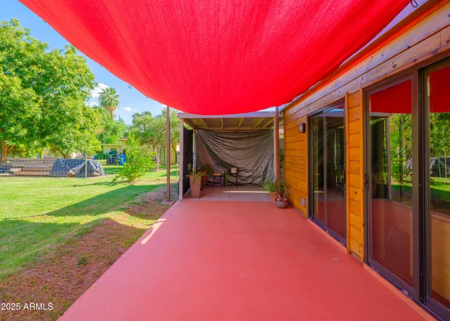 a view of a door and a yard in the back
