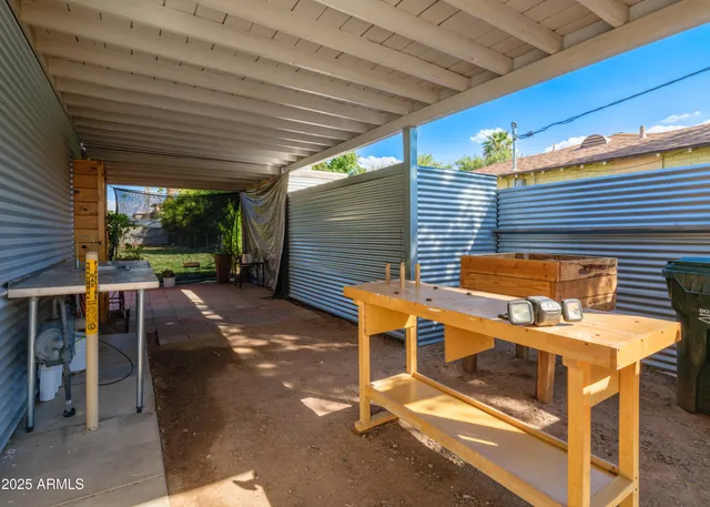 a view of a porch with wooden floor