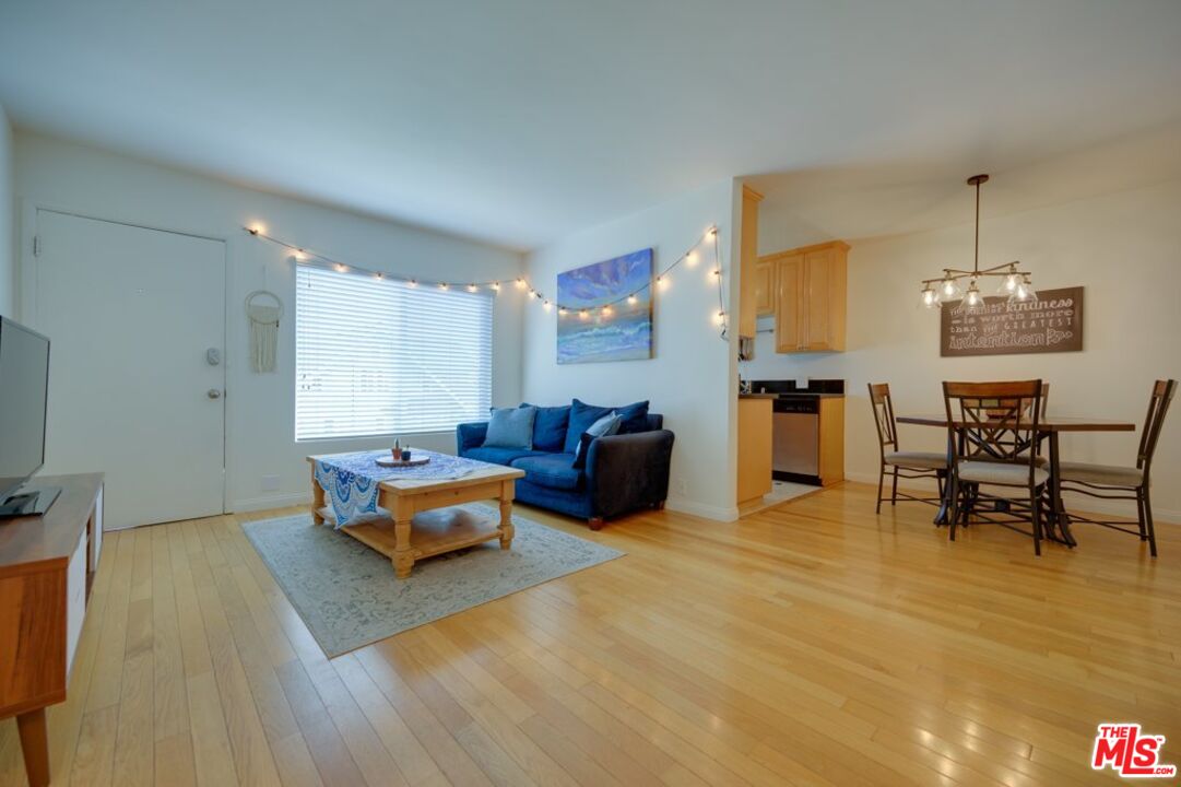 1918 11th Street, Unit F Santa Monica, CA 90404 - Photo 3 of 14 a lobby room with furniture and wooden floor