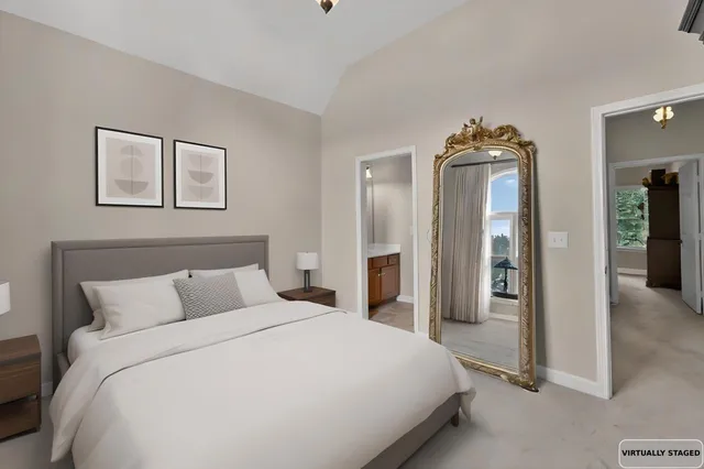 a white toilet sitting next to a shower