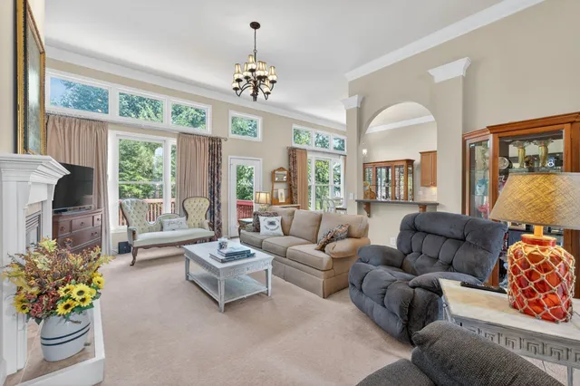 a spacious bedroom with a bed and a couch