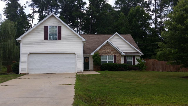 250 Autumn Ridge Court Gray, GA 31032 - Photo 1 of 12 a front view of house with yard and green space
