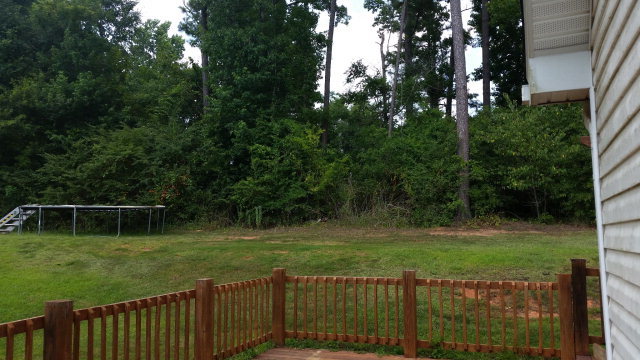 250 Autumn Ridge Court Gray, GA 31032 - Photo 11 of 12 a terrace with a bench and trees