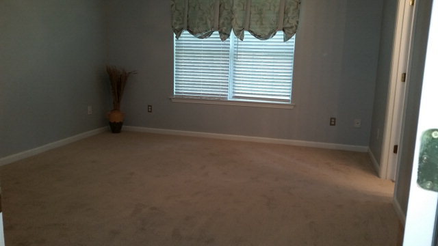 250 Autumn Ridge Court Gray, GA 31032 - Photo 7 of 12 a view of an empty room with a window