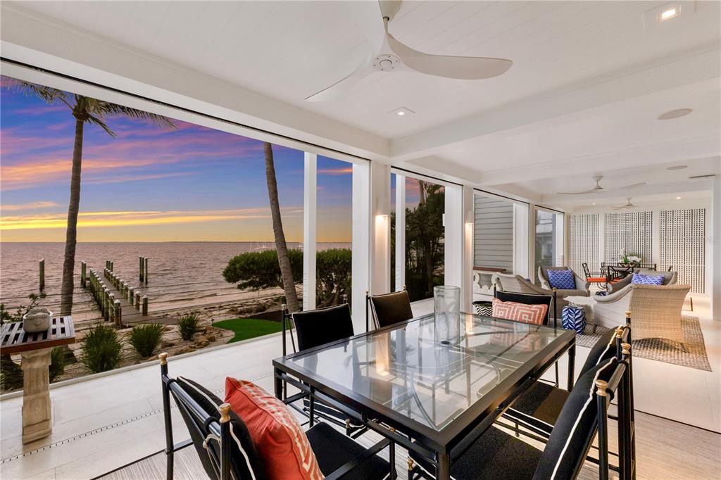 641 Boca Bay Drive Boca Grande, FL 33921 - Photo 20 of 98 a living room with furniture kitchen view and large windows