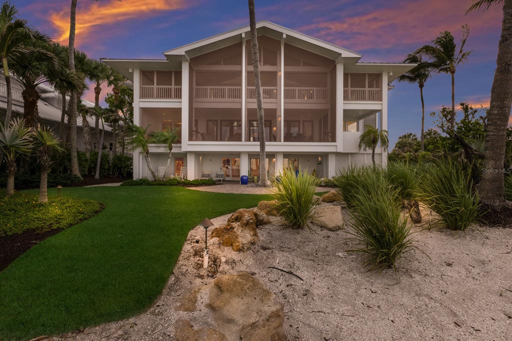641 Boca Bay Drive Boca Grande, FL 33921 - Photo 52 of 98 a view of a house with a yard
