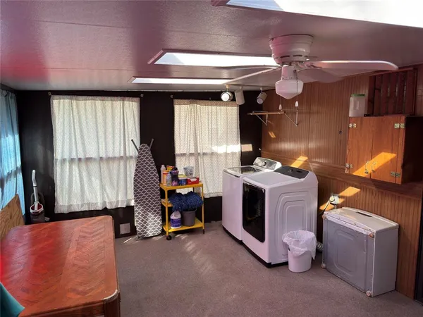 a room with furniture and a window