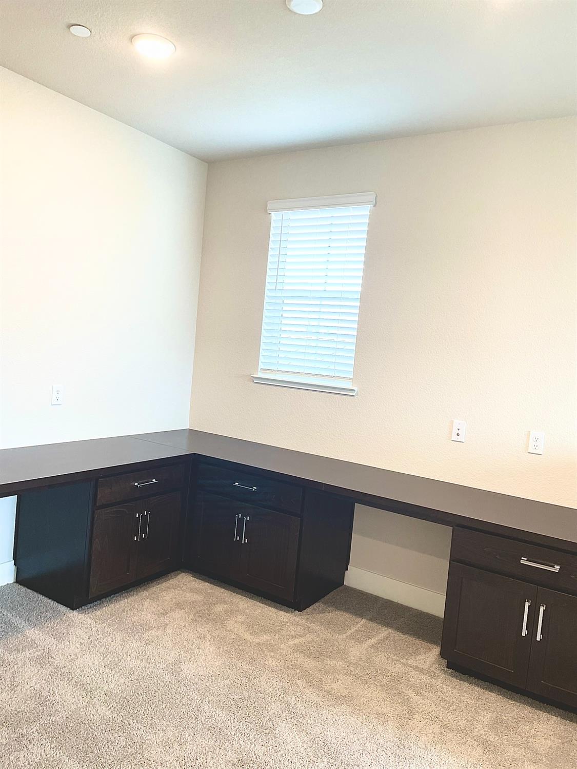 3068 Poas Way Rancho Cordova, CA 95742 - Photo 5 of 10 a room with a window and cabinet