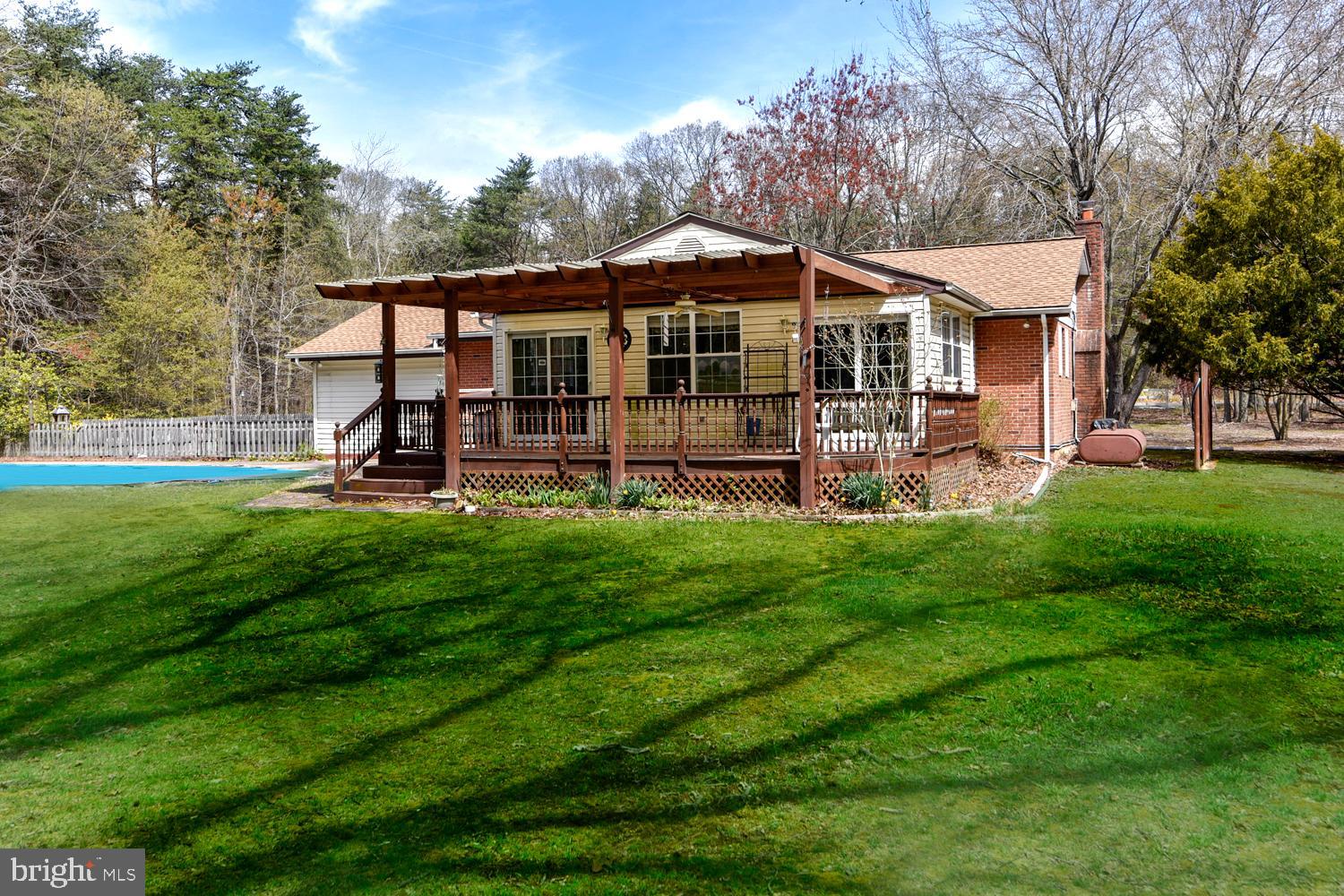 1661 Fairview Beach Road Pasadena, MD 21122 - Photo 2 of 37 Deck and Lush Lawns Awaiting Picnics and Play