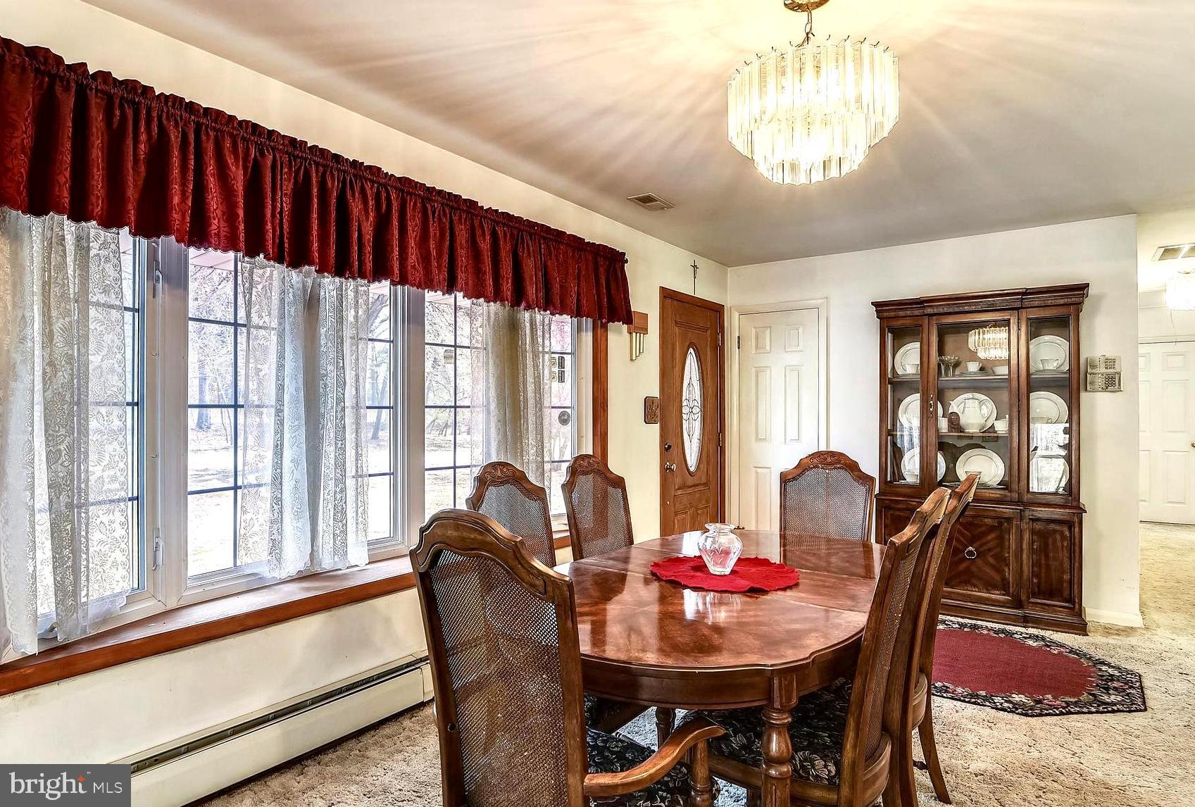 1661 Fairview Beach Road Pasadena, MD 21122 - Photo 11 of 37 Chandeliered Dining Room with Bay Window Bumpout