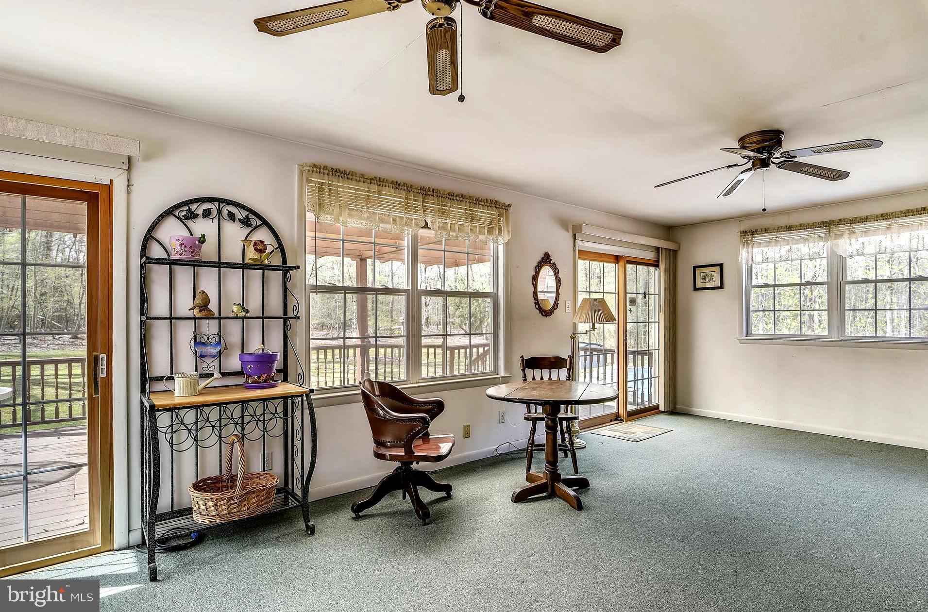 1661 Fairview Beach Road Pasadena, MD 21122 - Photo 3 of 37 Sunroom w/Gas Fireplace to Enjoy the Seasons