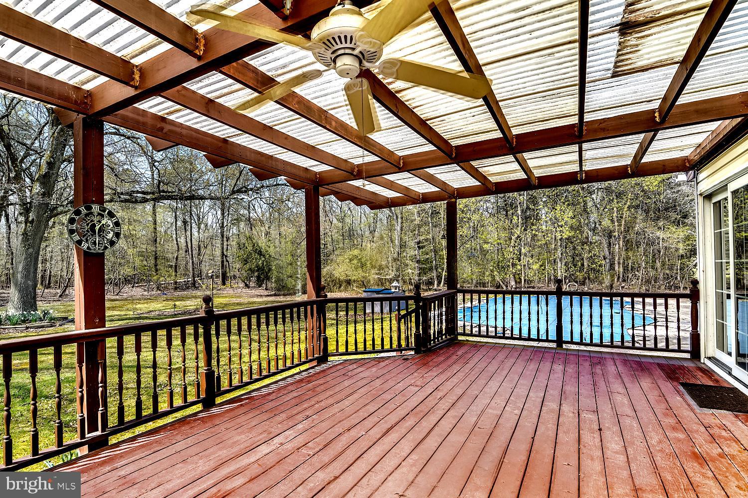 1661 Fairview Beach Road Pasadena, MD 21122 - Photo 4 of 37 Dining/Entertaining Deck Overlooking the Pool