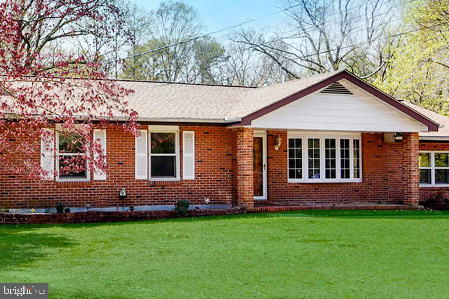 1661 Fairview Beach Road Pasadena, MD 21122 - Photo 9 of 37 Landscaped Entry . Covered Brick Porch