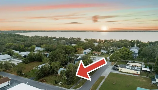 an aerial view of houses with outdoor space