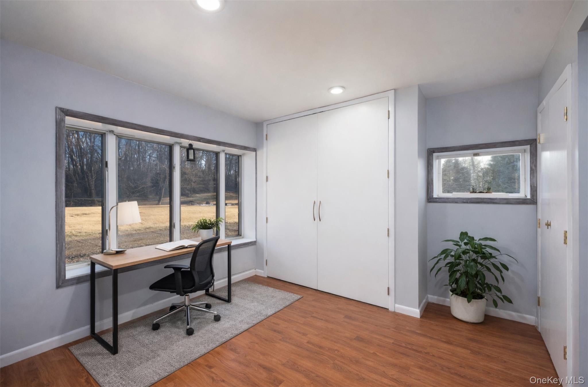 27 Spice Hill Road Croton-on-Hudson, NY 10520 - Photo 18 of 20 a view of a workspace with furniture and a window