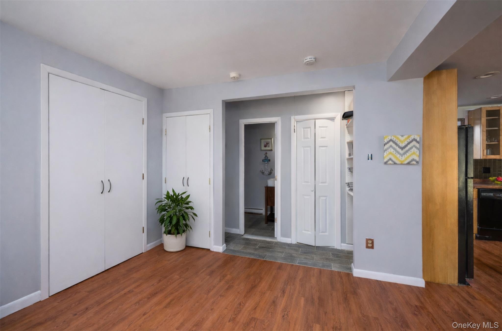 27 Spice Hill Road Croton-on-Hudson, NY 10520 - Photo 19 of 20 a view of an empty room with wooden floor and a window