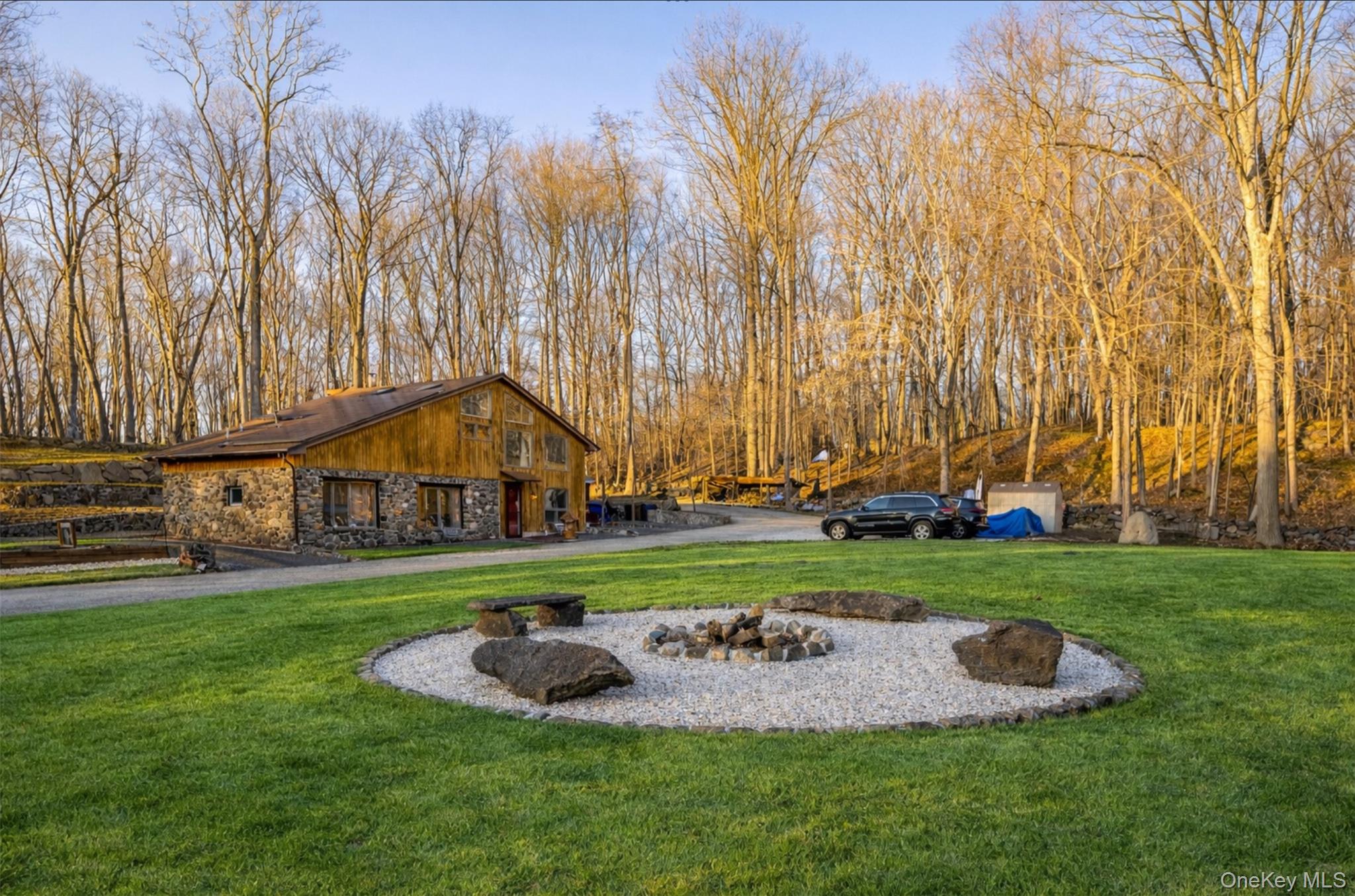 27 Spice Hill Road Croton-on-Hudson, NY 10520 - Photo 2 of 20 a backyard of a house with a yard and outdoor seating