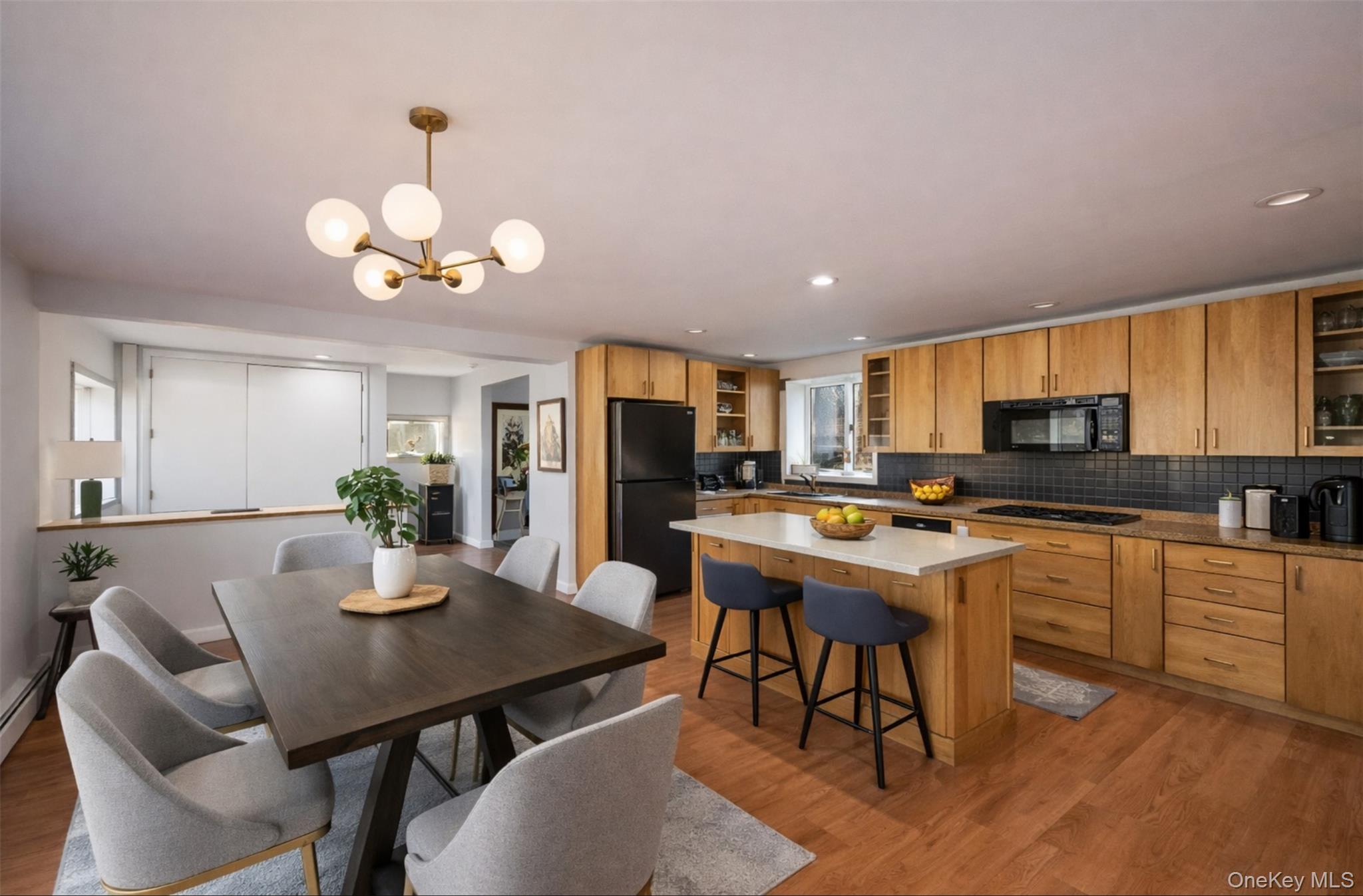 27 Spice Hill Road Croton-on-Hudson, NY 10520 - Photo 10 of 20 a view of a dining room with furniture window and wooden floor