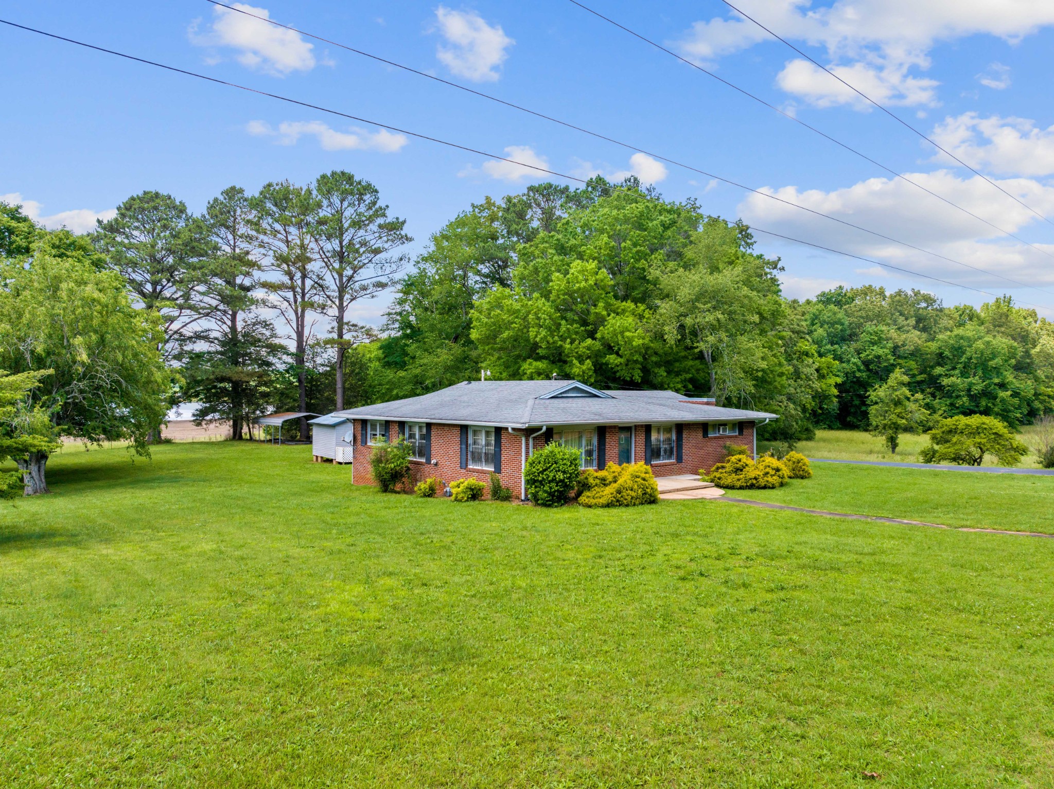 a view of a house with a big yard