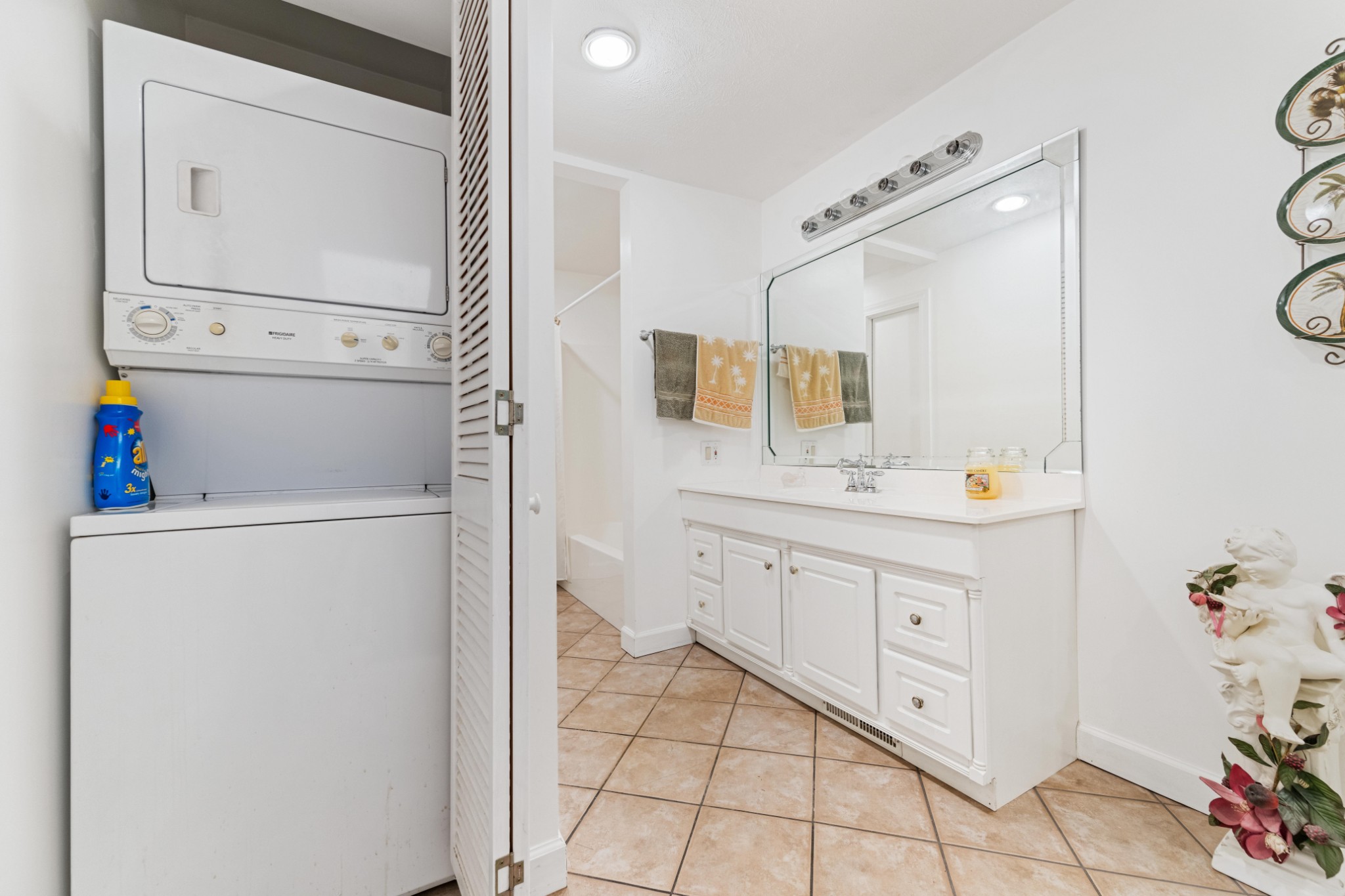 4519 Highway 100 Decaturville, TN 38329 - Photo 11 of 31 a bathroom with a double vanity sink mirror and