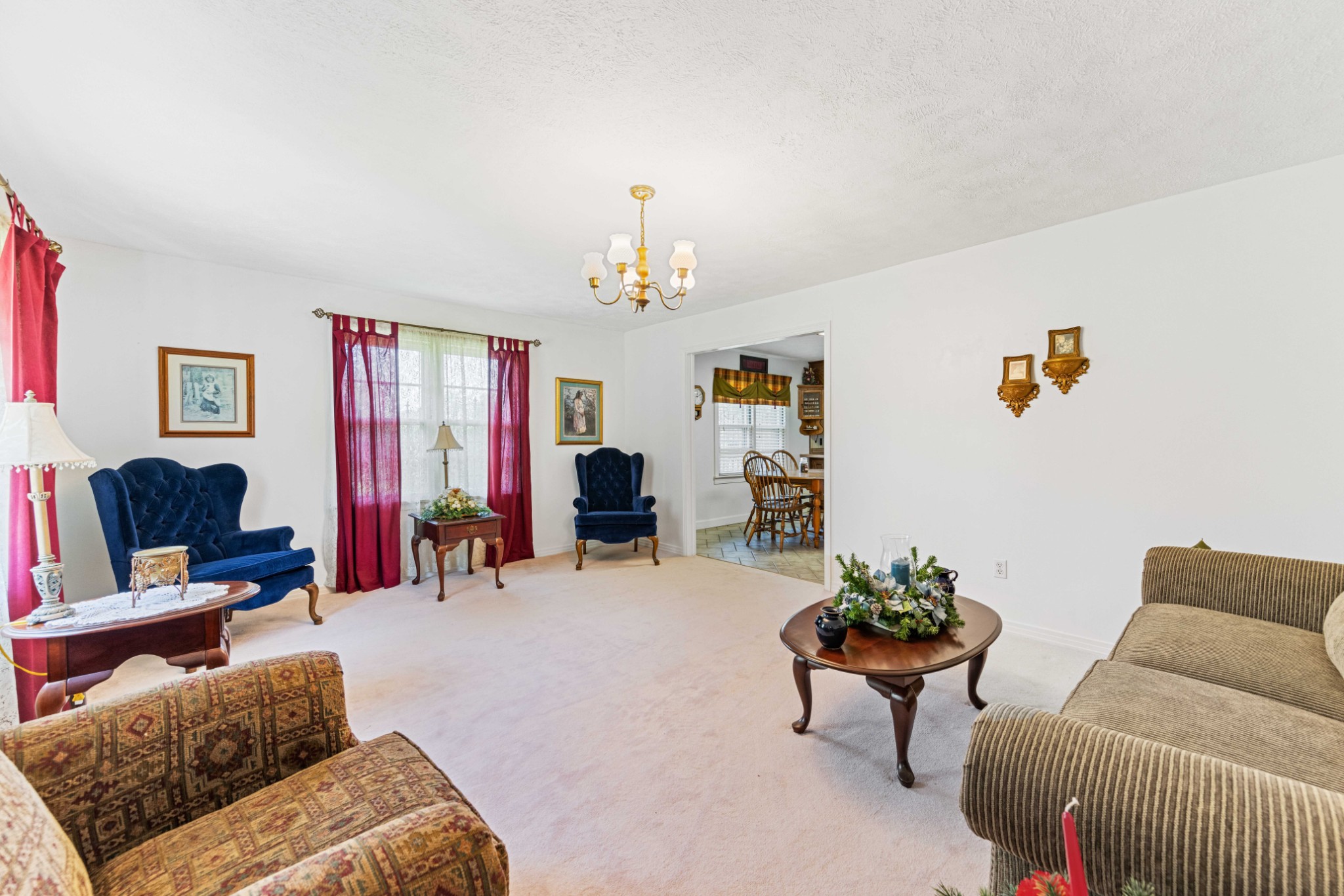 4519 Highway 100 Decaturville, TN 38329 - Photo 19 of 31 a living room with furniture and a flat screen tv