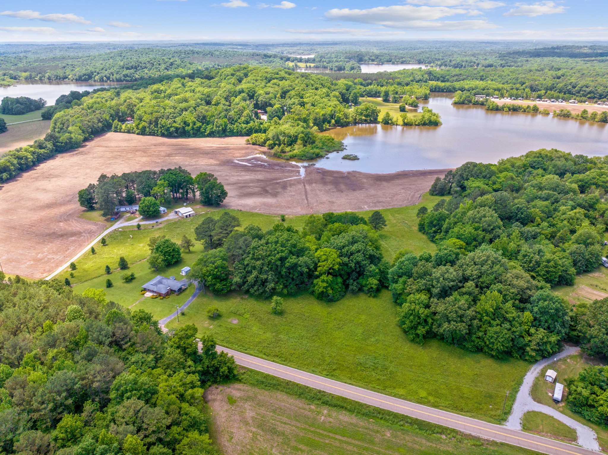 4519 Highway 100 Decaturville, TN 38329 - Photo 22 of 31 a view of a lake with a mountain in the back