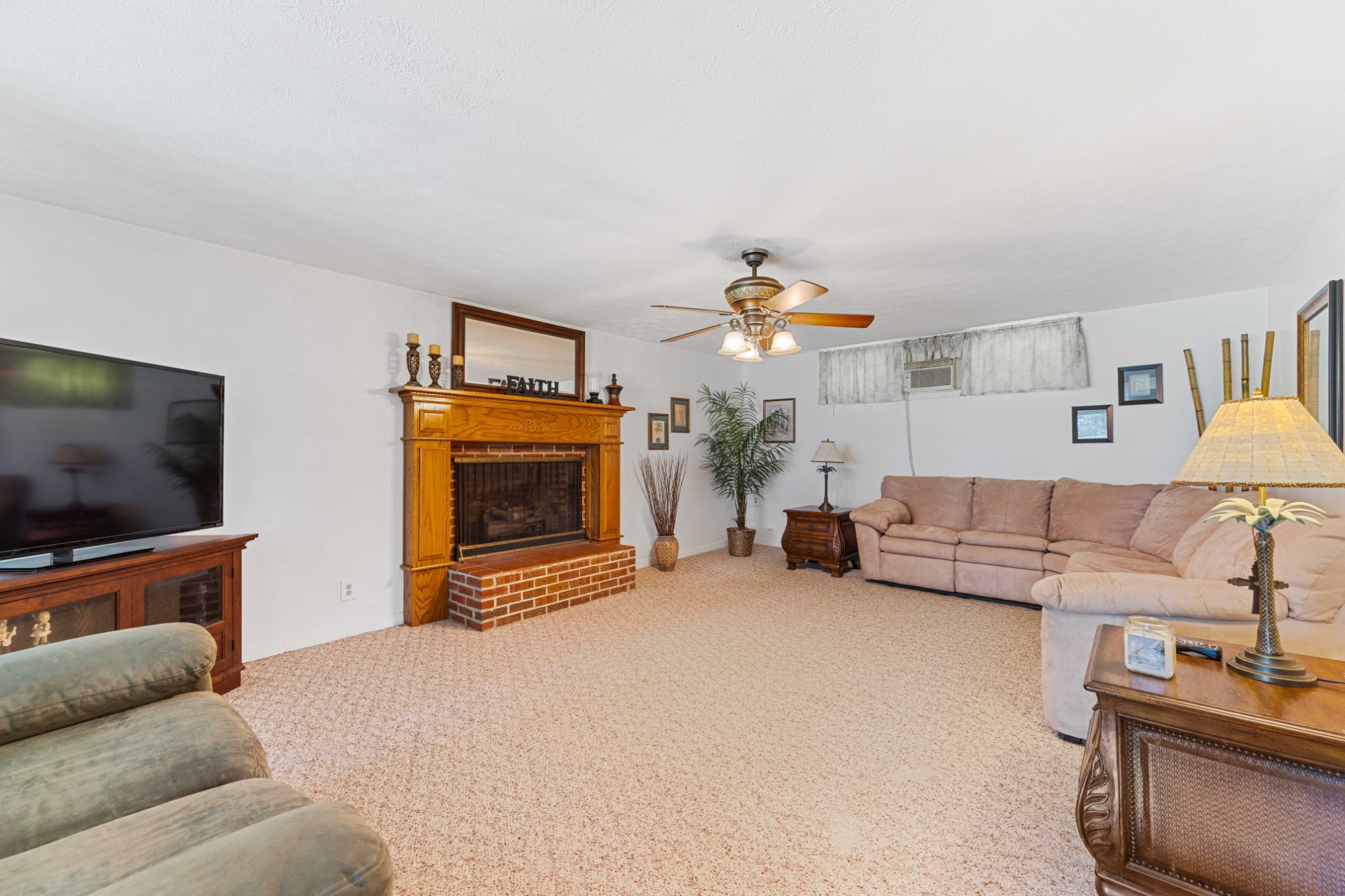 4519 Highway 100 Decaturville, TN 38329 - Photo 7 of 31 a living room with furniture and a flat screen tv