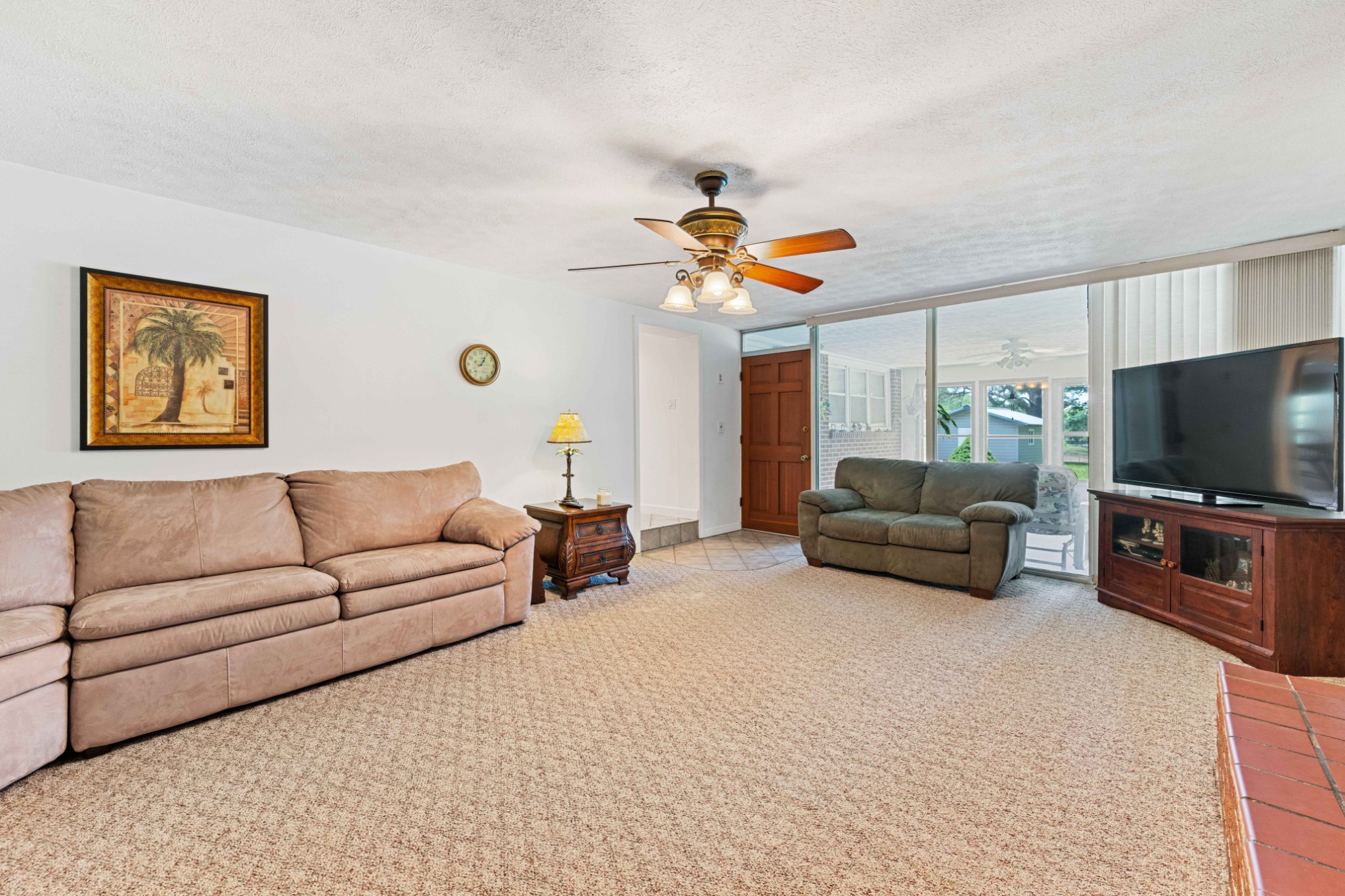 4519 Highway 100 Decaturville, TN 38329 - Photo 8 of 31 a living room with furniture and a flat screen tv