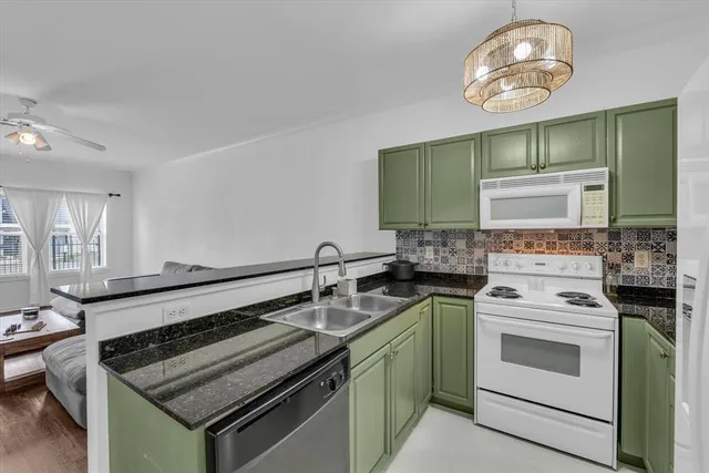 a kitchen with a stove and a sink