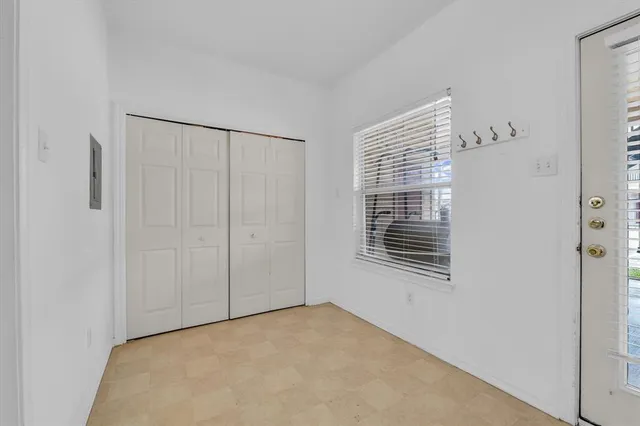 a view of a room with windows