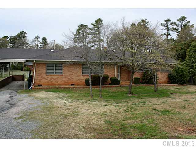 735 Belleview Road Rock Hill, SC 29730 - Photo 1 of 12 a backyard of a house with table and chairs