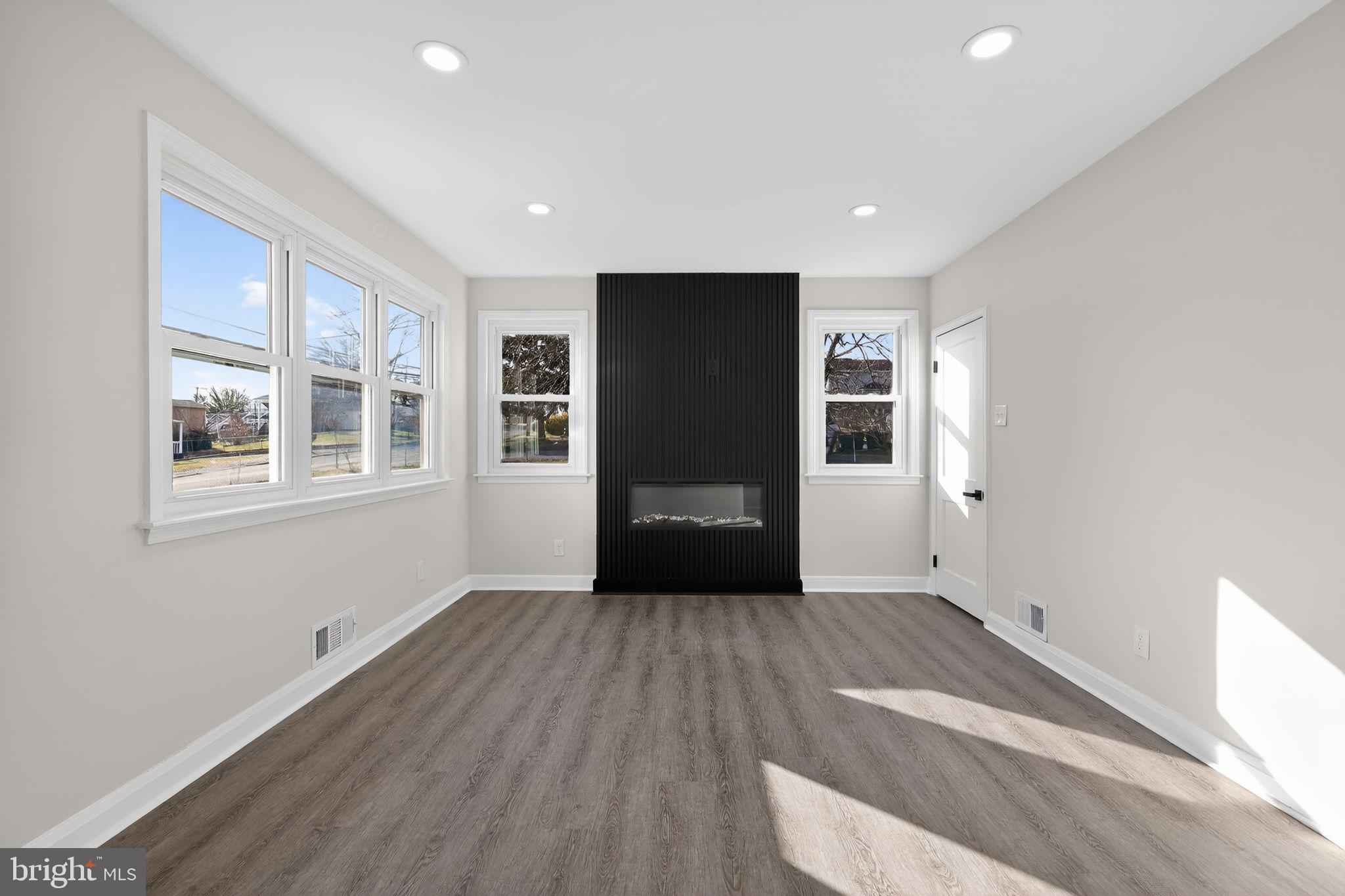 7908 Underhill Road Baltimore, MD 21237 - Photo 6 of 30 Stunning horizontal fireplace in LR
