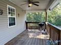 70 Covington Rdg Drive Jacksonville, AL 36265 - Photo 14 of 42 a view of backyard and deck