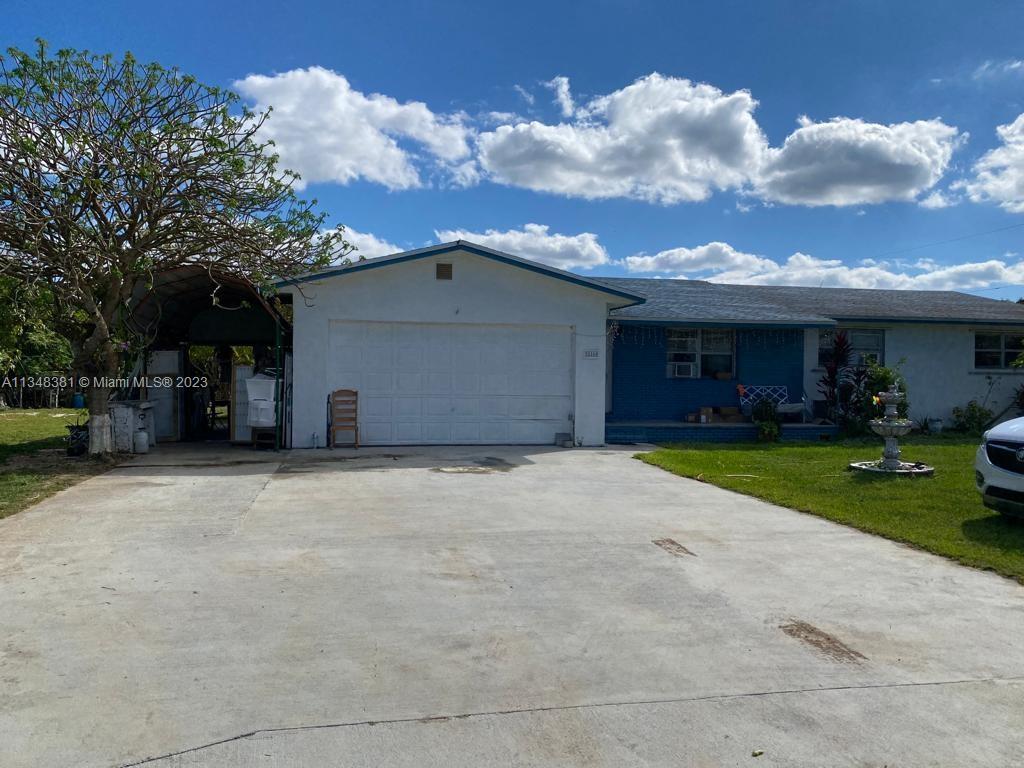 Everglades Homestead, FL 33030 - Photo 2 of 11 a house view with a garden space