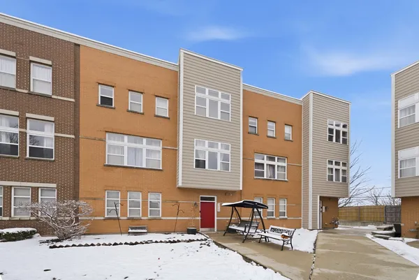 a front view of a building with street view